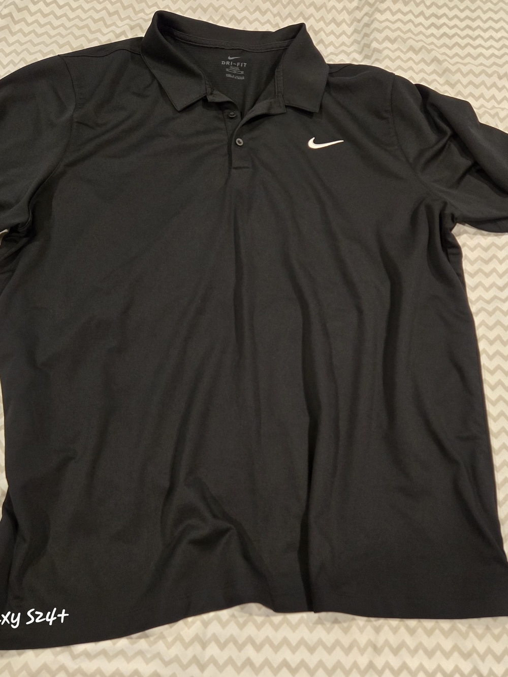 Nike Black Polo Shirt with White Swoosh